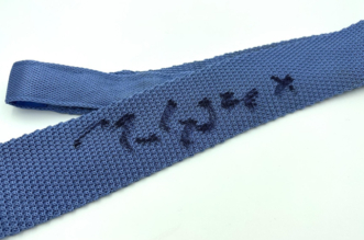 Mark Knopfler Donates Signed Tie to Online Auction in Support of Testicular Cancer Charity