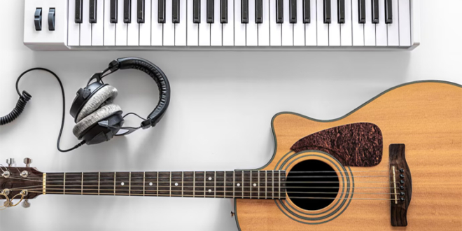 Acoustic Guitar and Musical Keys on Synthesizer A Perfect Match