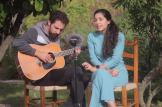 Anabela and Joao Gusmao Unveil a Serene Rendition of "Brothers in Arms" in a Garden Setting