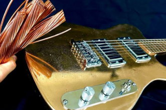 Burls Art 40-pound Steampunk bronze guitar made from copper and tin
