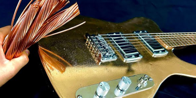 Burls Art 40-pound Steampunk bronze guitar made from copper and tin