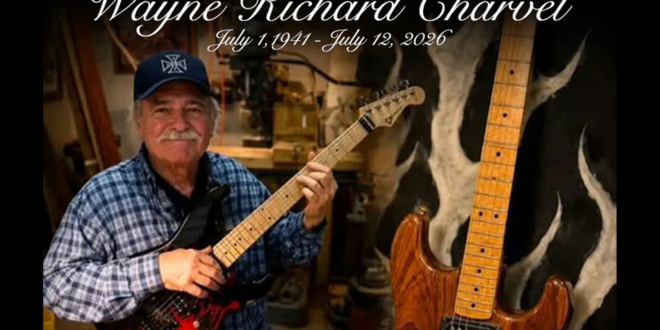 Wayne Charvel with a vintage Charvel electric guitar